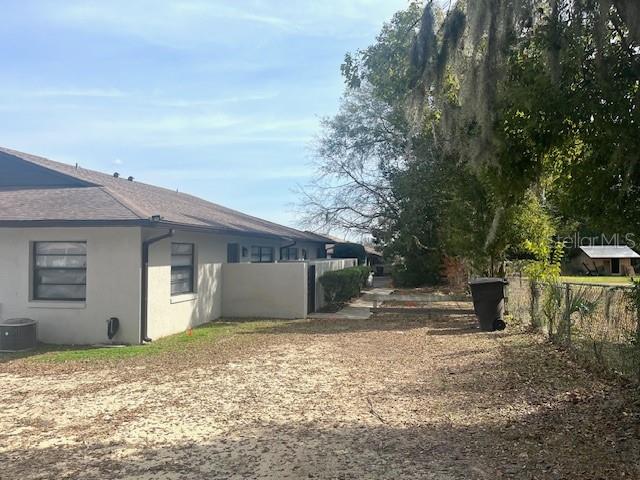 1902 Northeast 17th Place Ocala, FL 34470 - Photo 5 of 28 a house view with a backyard