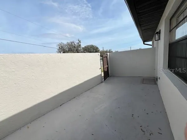 a view of a livingroom with a kitchen