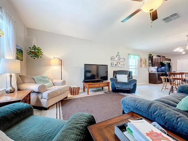 a sitting area with wooden benches