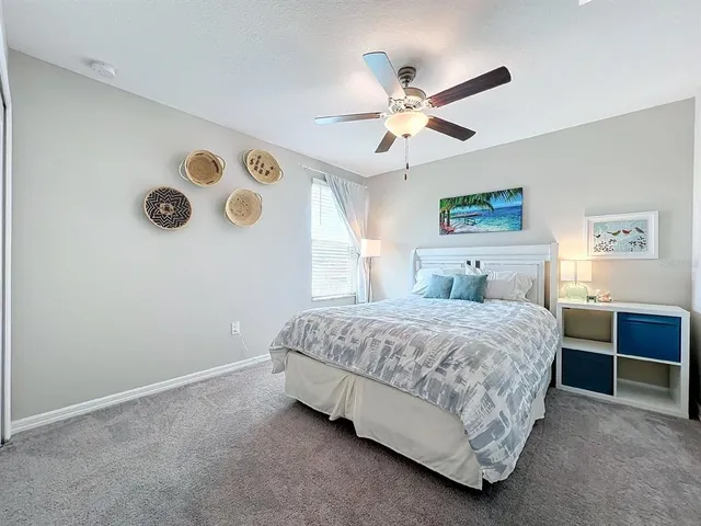 an aerial view of a residential houses with outdoor space