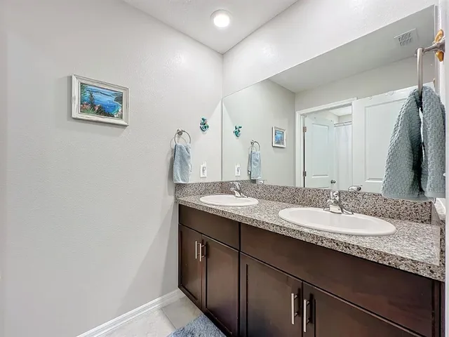 a view of a swimming pool with outdoor seating and yard