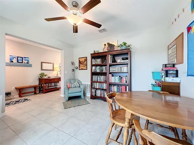 a spacious bathroom with a double vanity sink and a mirror
