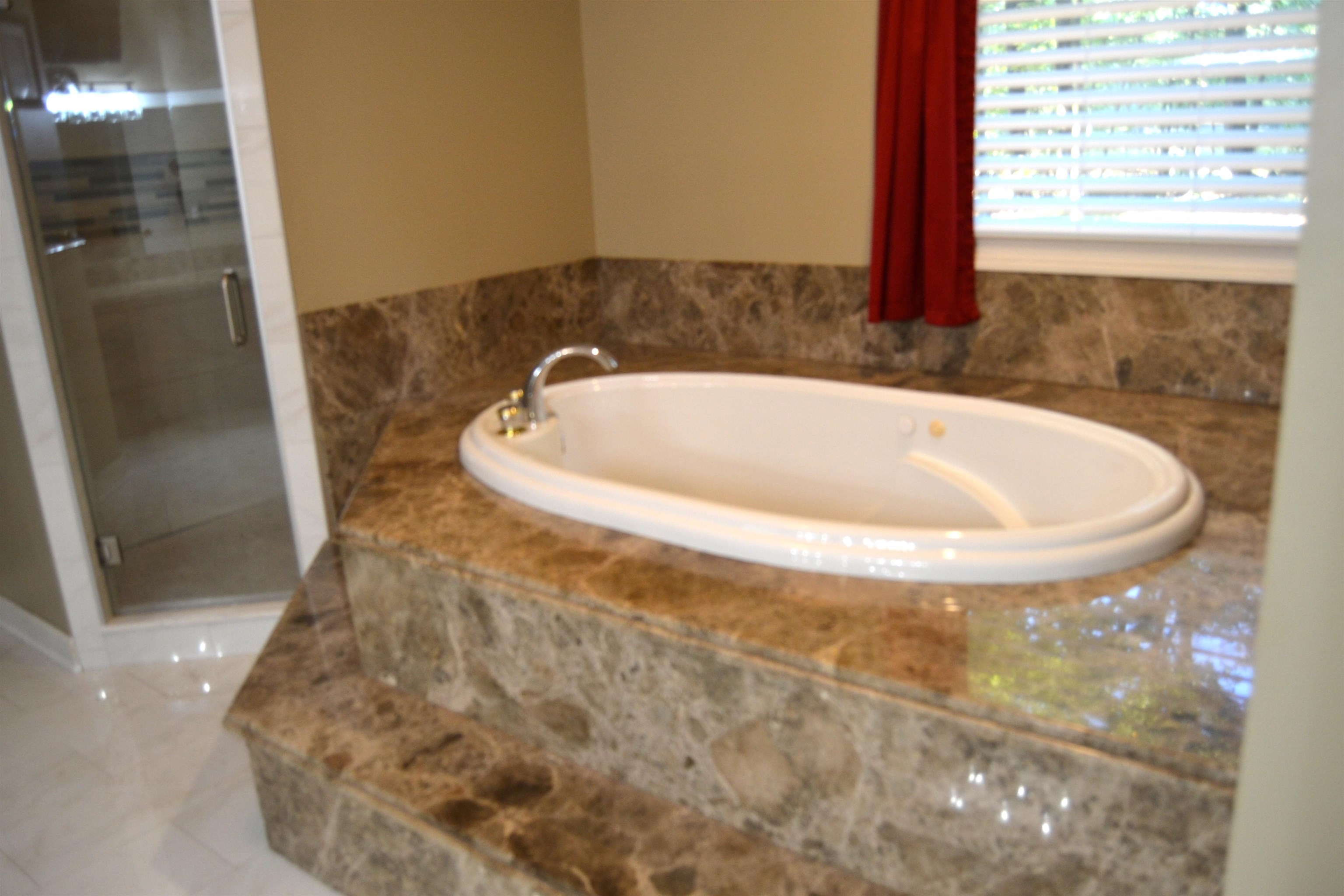 470 Walnut Point Cove Memphis, TN 38018 - Photo 20 of 37 Full bathroom featuring a bath and a walk-in shower