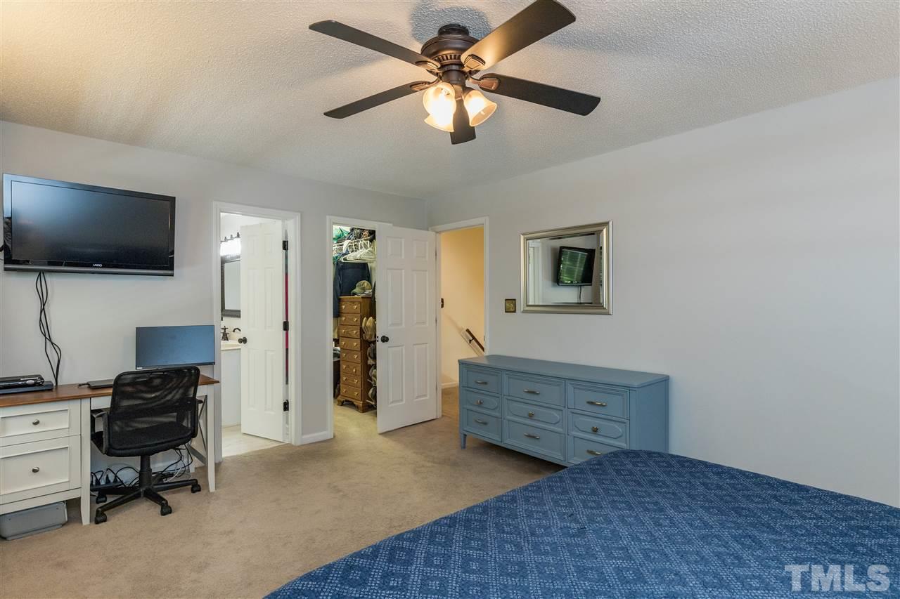 6004 Dedmon Place Raleigh, NC 27616 - Photo 16 of 30 a view of workspace with a flat screen tv