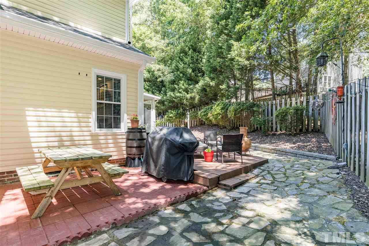 6004 Dedmon Place Raleigh, NC 27616 - Photo 28 of 30 a view of a patio with couple of chairs