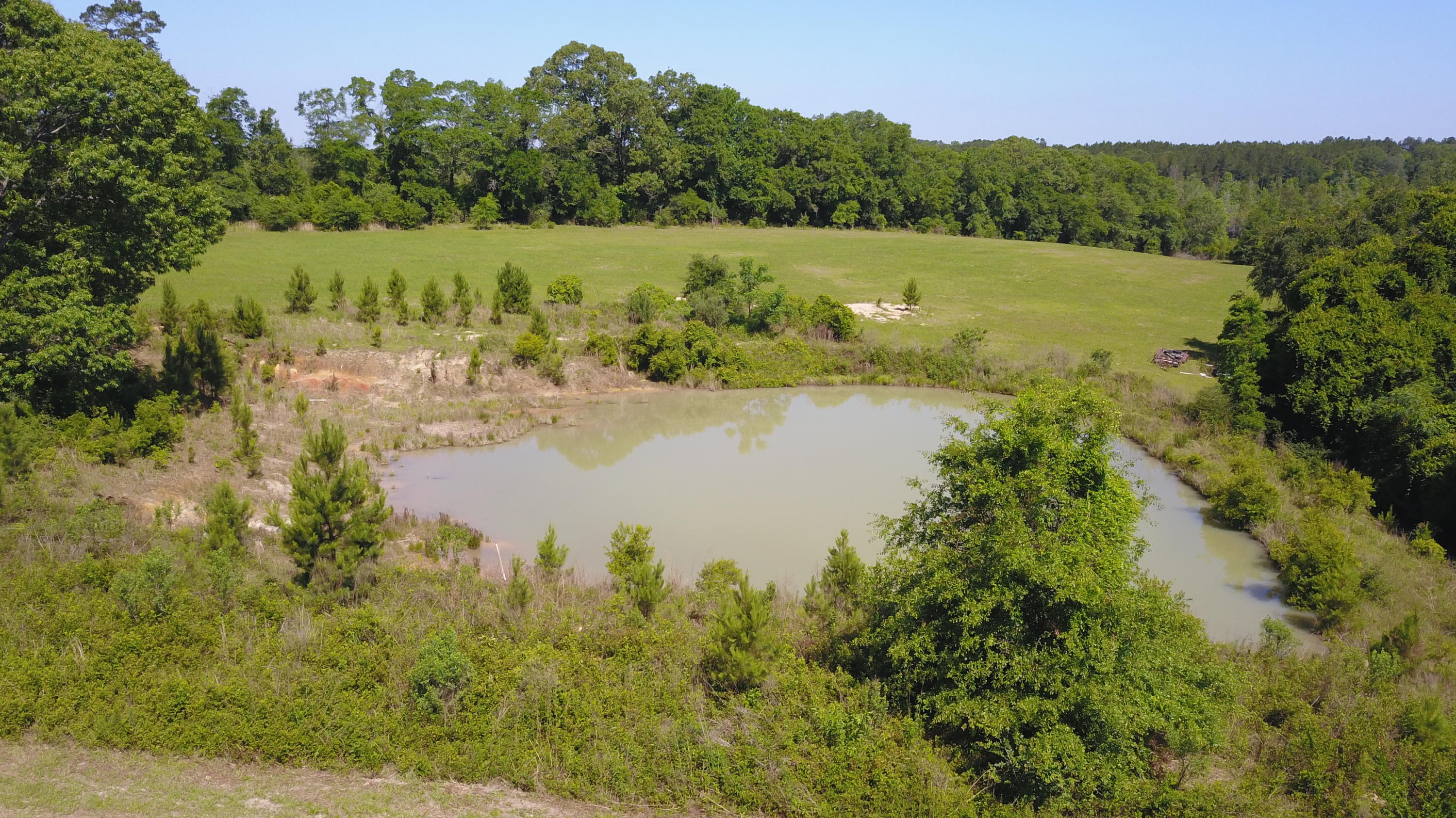17-ac Old River Road Baker, FL 32531 - Photo 2 of 7 a view of a lake with houses in the back