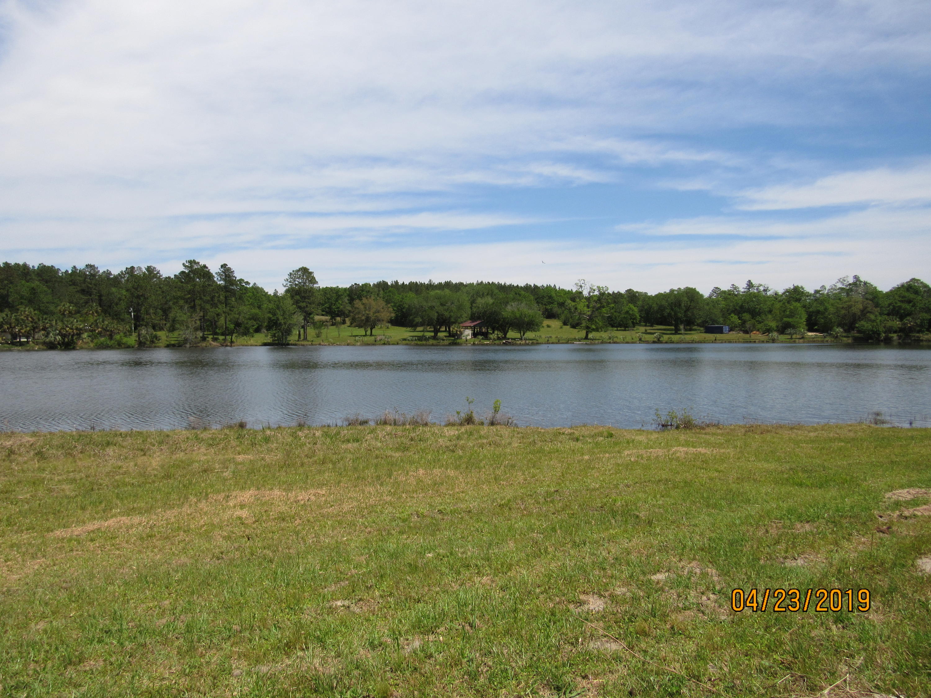 17-ac Old River Road Baker, FL 32531 - Photo 5 of 7 a view of a lake with a city