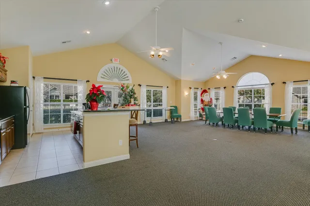 a view of a living room and dining room