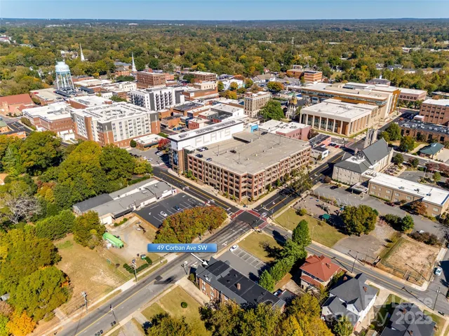 an aerial view of residential building with parking space