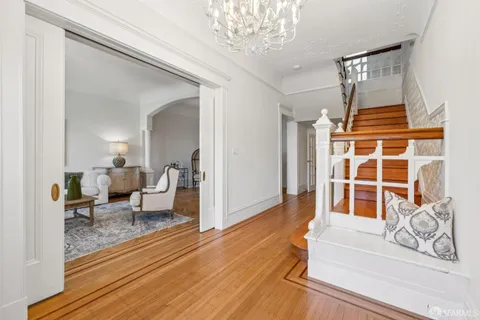 a view of a bathroom with tub and shower