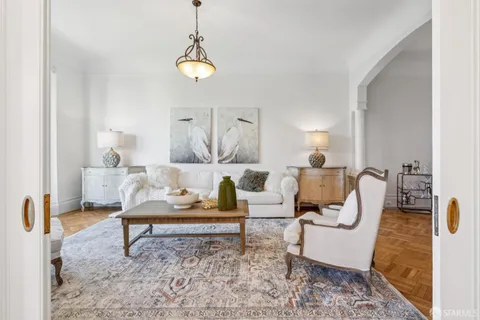 a stove sitting inside of a kitchen with granite countertop