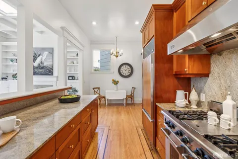 a spacious bedroom with a bed and a couch