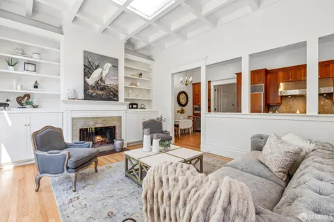 a view of yard with tree in front of it