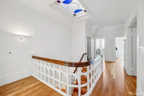 a bed room with a bed and a window