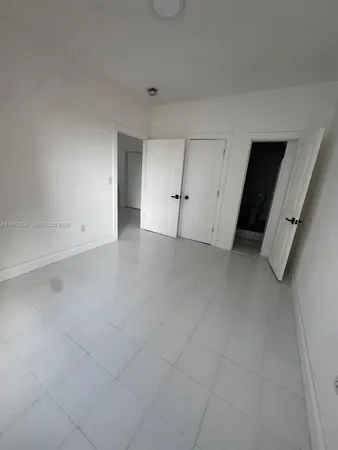 an empty room with a natural light