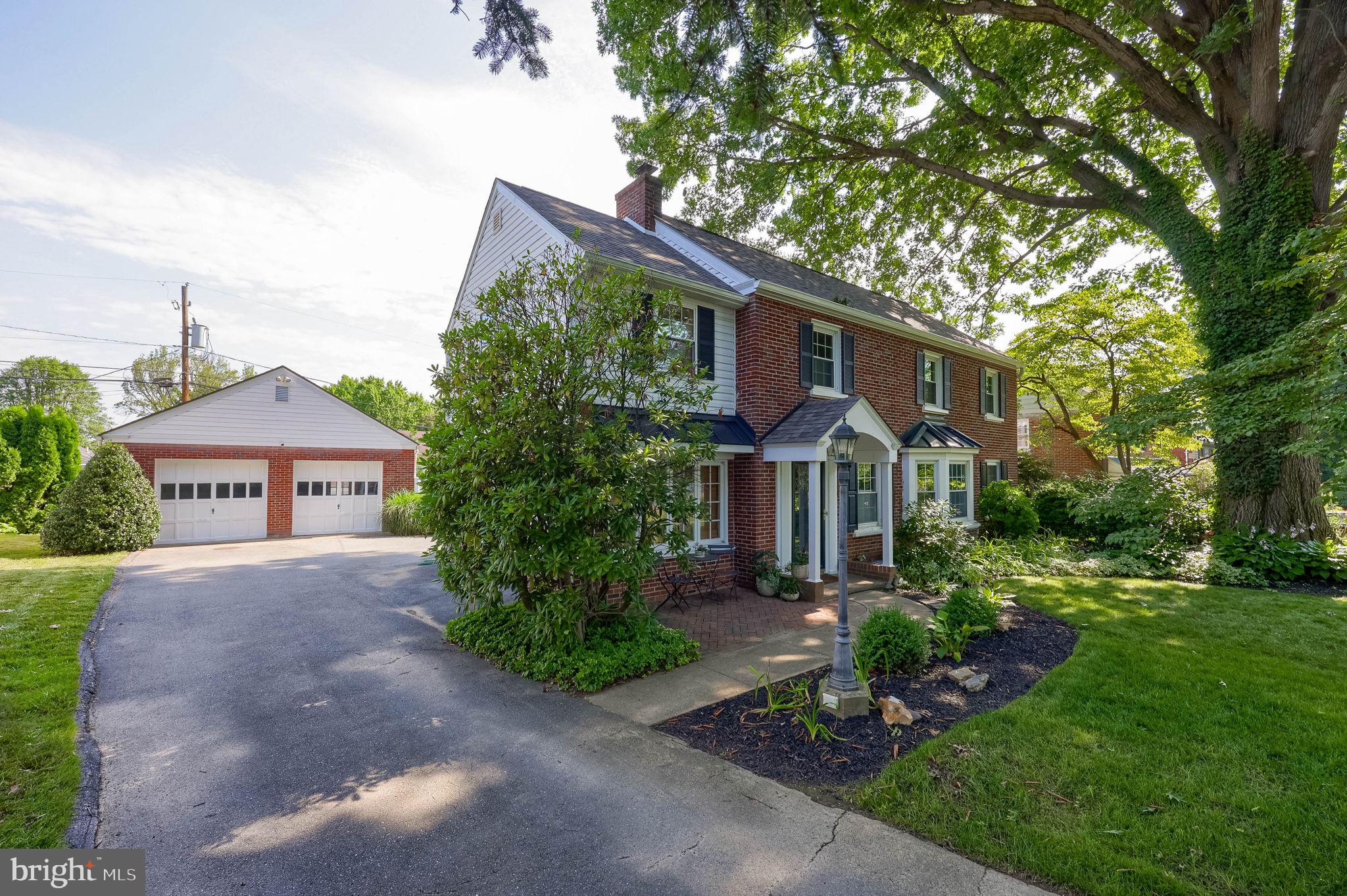 1709 Ridgeview Avenue Lancaster, PA 17603 - Photo 2 of 77 Charming brick home with lush greenery.