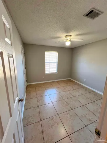 a view of a big room with a yard