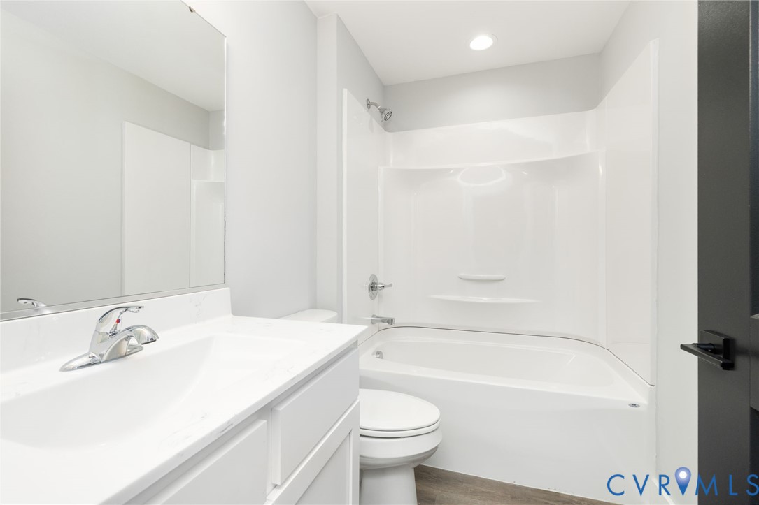 2085 Skippers Road Emporia, VA 23847 - Photo 18 of 34 a bathroom with a sink a toilet and a bathtub