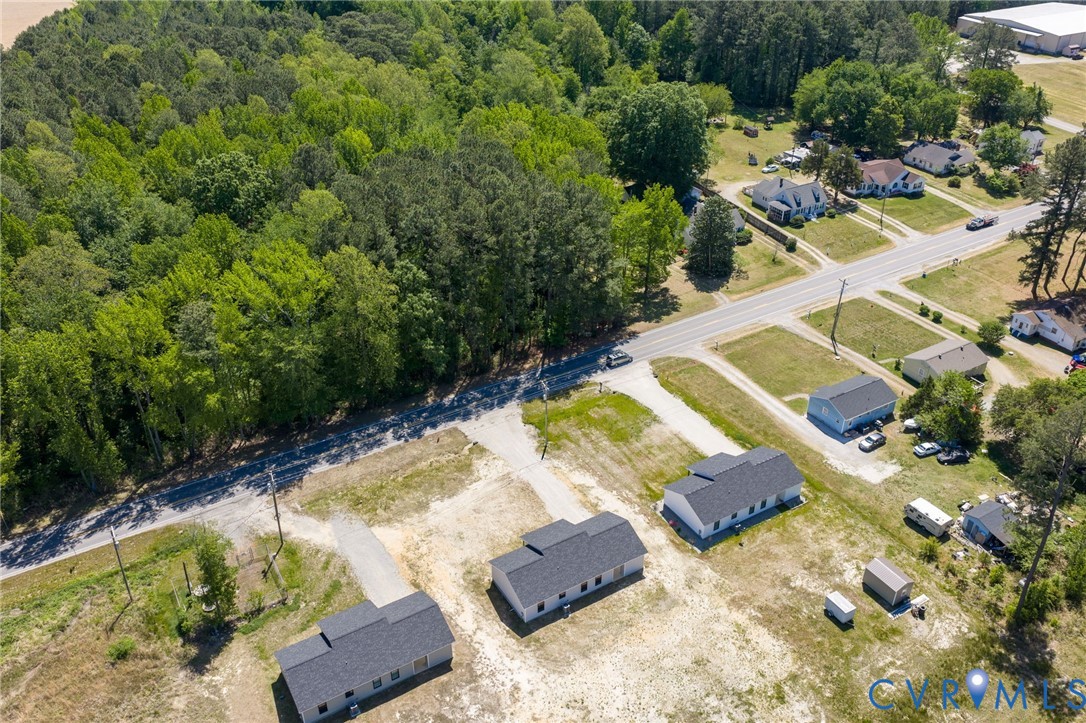 2085 Skippers Road Emporia, VA 23847 - Photo 29 of 34 an aerial view of a house with swimming pool and lake view
