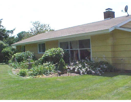 7 Francine Road Framingham, MA 01701 - Photo 10 of 26 a front view of a house with garden