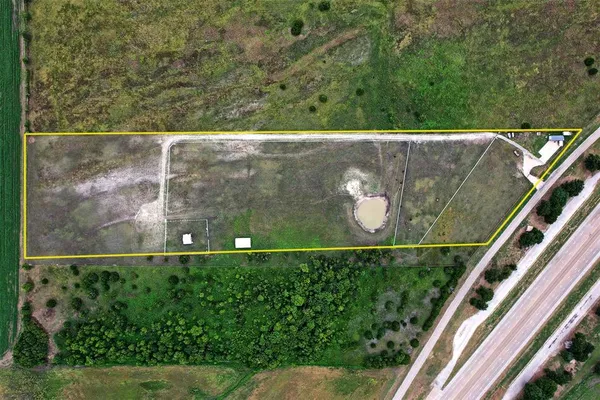 a view of a garden from a balcony