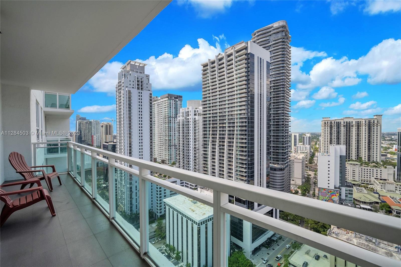 Brickell Miami, FL 33131 - Photo 6 of 29 a view of a balcony with two chairs