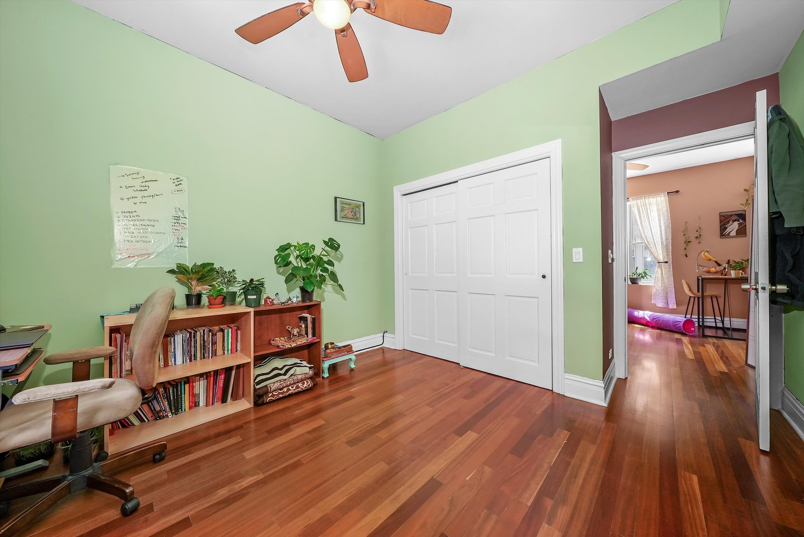 5342 North Winthrop Avenue, Unit 2E Chicago, IL 60640 - Photo 5 of 8 a living room with furniture and a wooden floor
