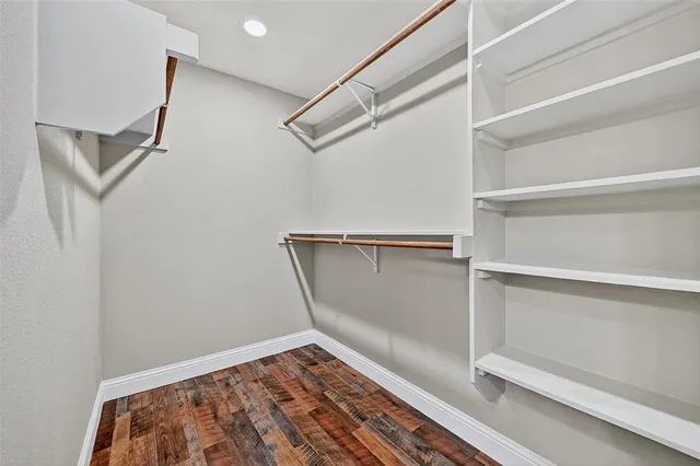 a view of an empty walk in closet
