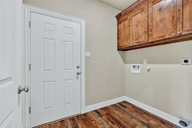 a view of a storage & utility room with racks on the wall
