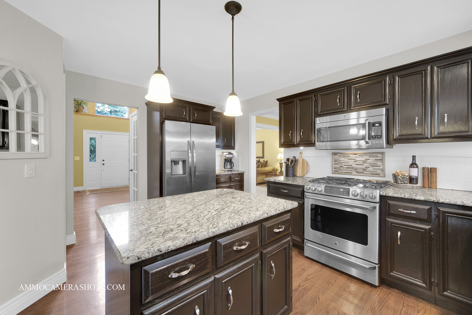 1840 Marne Road Bolingbrook, IL 60490 - Photo 12 of 37 a kitchen with stainless steel appliances granite countertop wooden cabinets and a stove