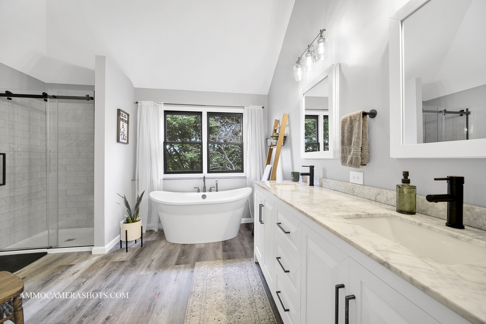 1840 Marne Road Bolingbrook, IL 60490 - Photo 21 of 37 a spacious bathroom with a double vanity sink a mirror and a bathtub