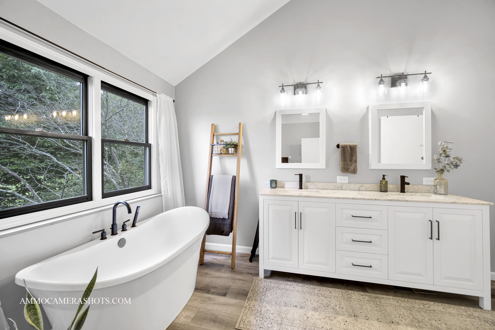 1840 Marne Road Bolingbrook, IL 60490 - Photo 22 of 37 a bathroom with a double vanity sink a mirror and a bathtub