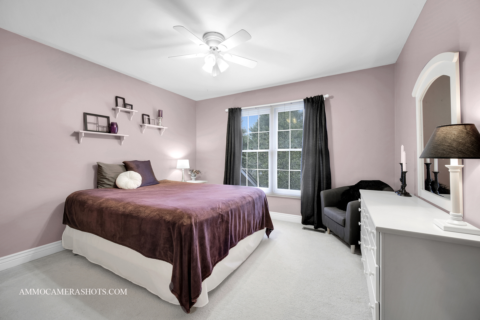 1840 Marne Road Bolingbrook, IL 60490 - Photo 23 of 37 a bedroom with a large bed and a chandelier
