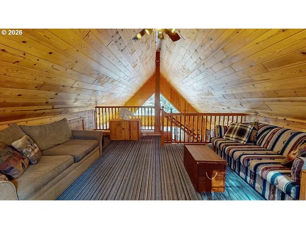 a black and white photo of a living room