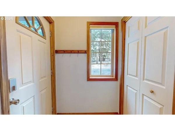 a black and white photo of a living room