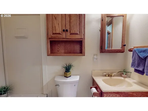a bathroom with sink and mirror