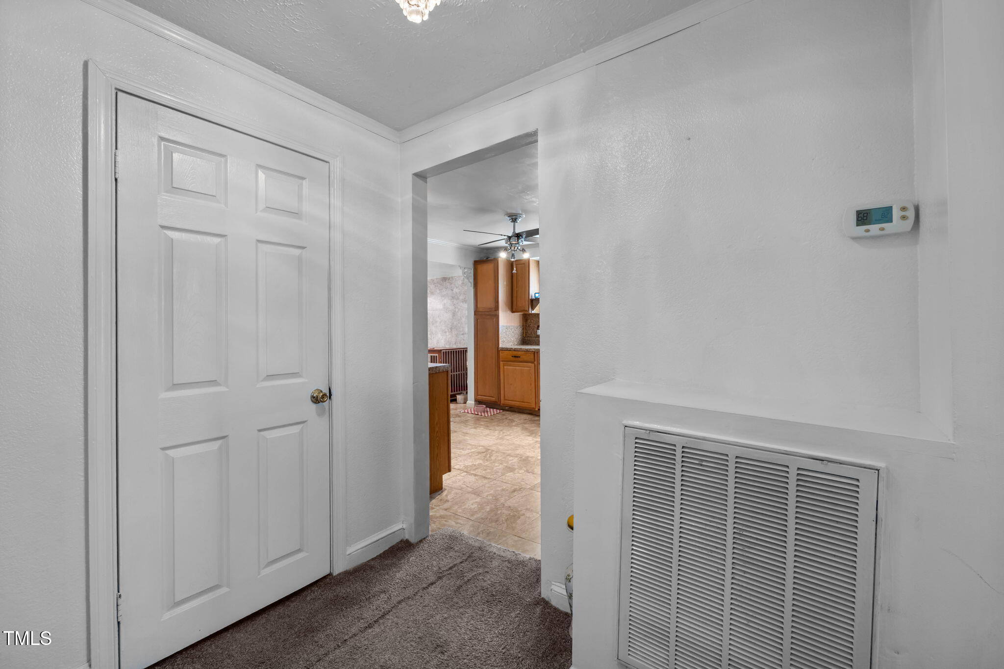 122 Old Surl Road Roxboro, NC 27574 - Photo 17 of 45 a view of a hallway with wooden cabinet