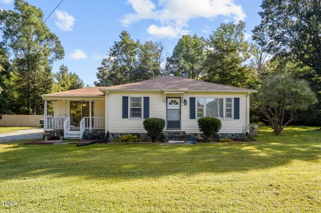 a view of a house with a swimming pool