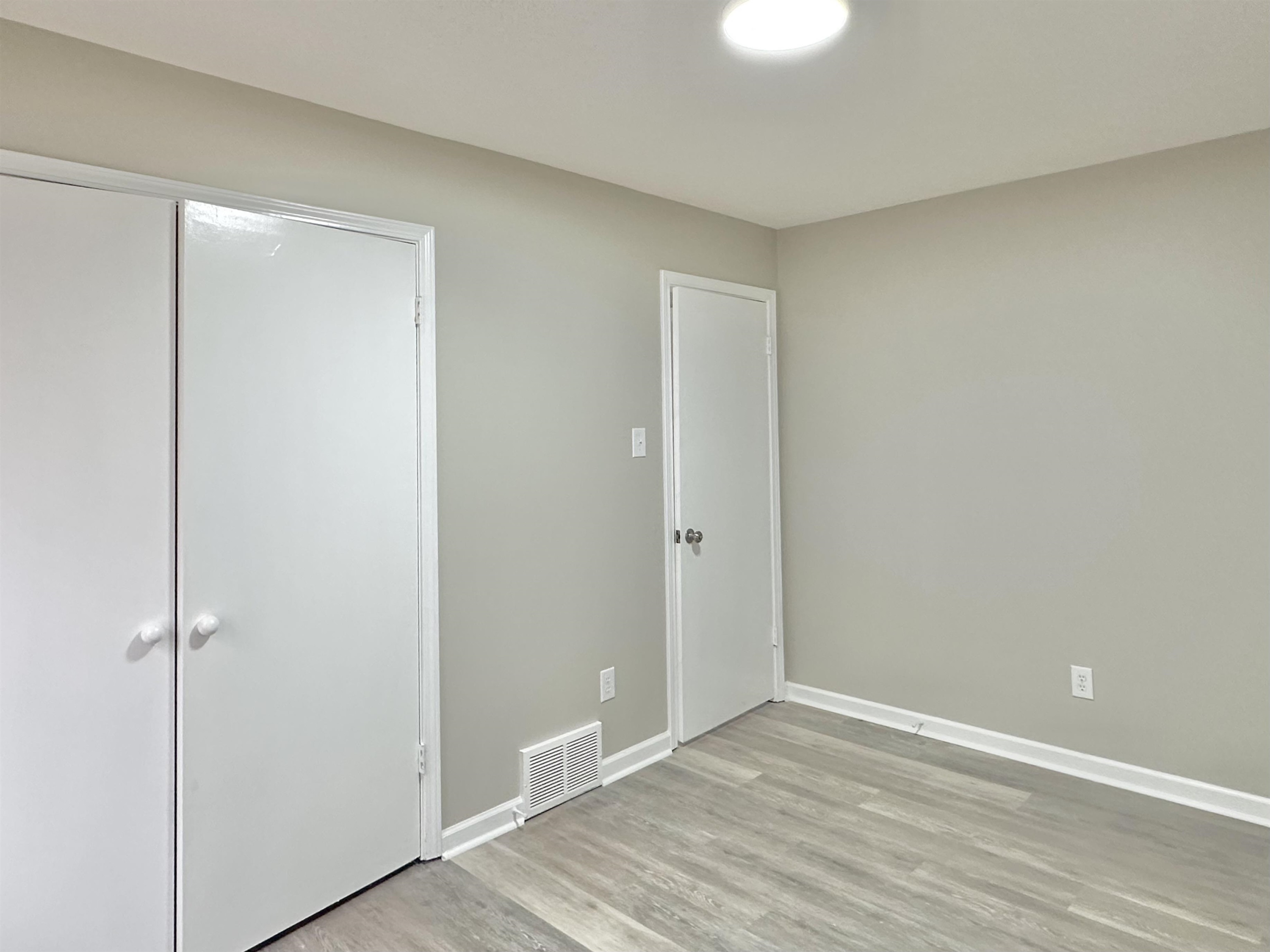 4376 Coleman Road Memphis, TN 38128 - Photo 11 of 21 a view of an empty room with wooden floor