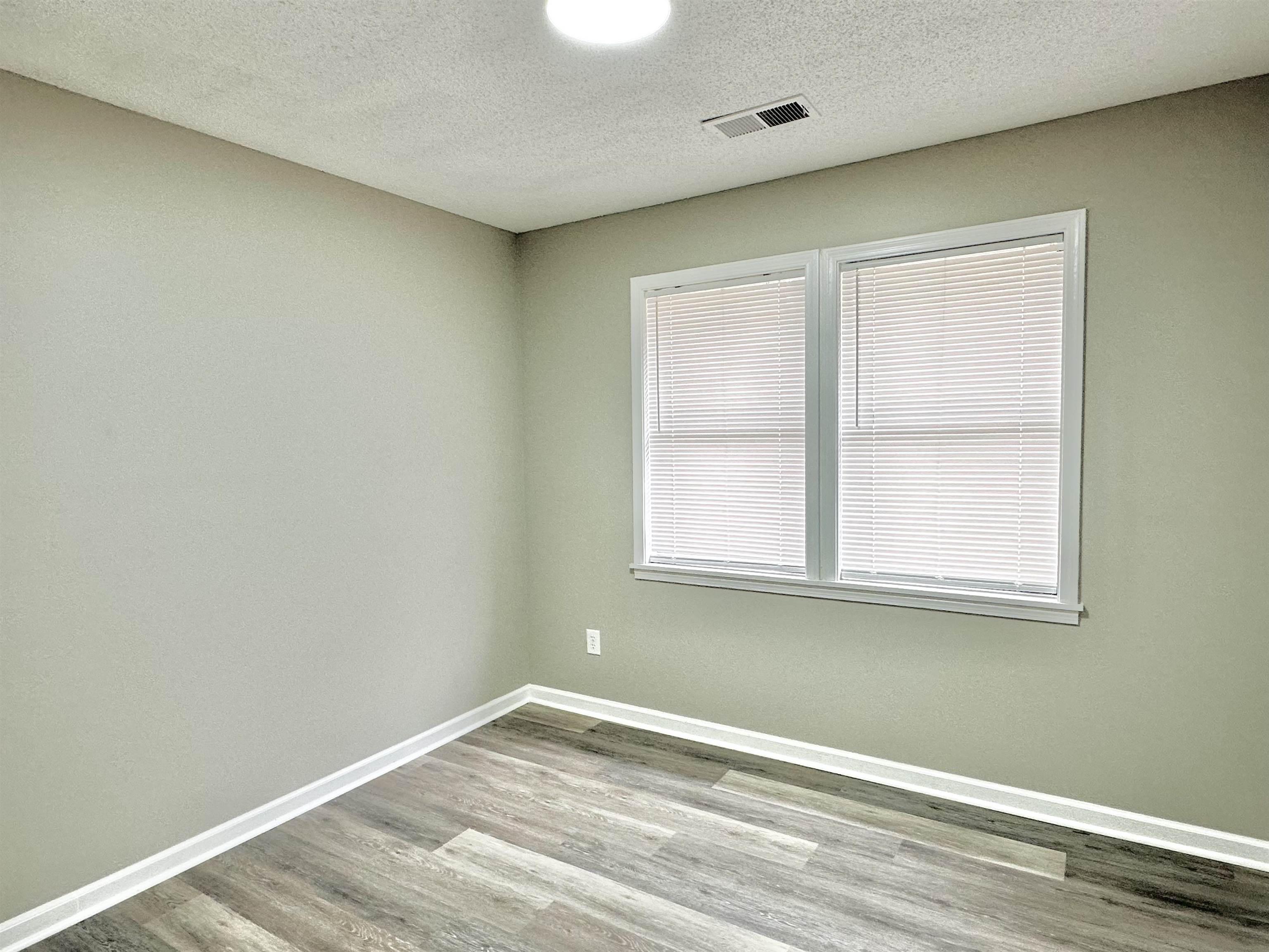 4376 Coleman Road Memphis, TN 38128 - Photo 12 of 21 an empty room with a window