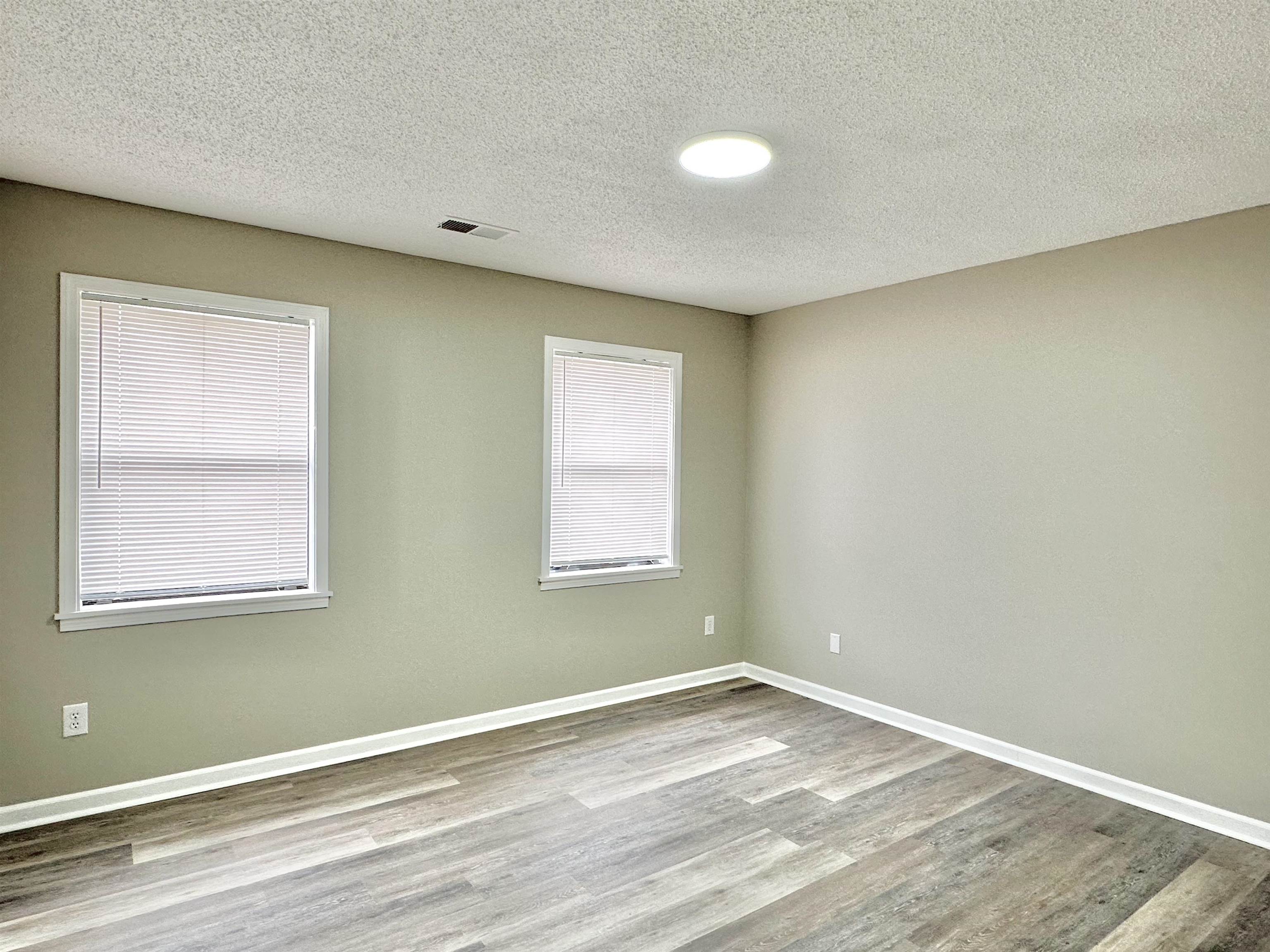 4376 Coleman Road Memphis, TN 38128 - Photo 8 of 21 an empty room with a window