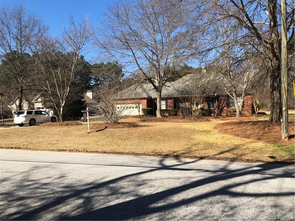 4750 Govanett Road Powder Springs, GA 30127 - Photo 1 of 1 Front of Beautiful 4-Sided Brick Ranch. Large level lot in Cobb County