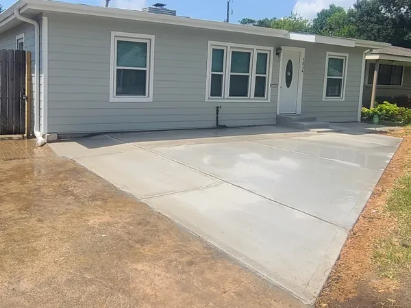 a house with yard in front of it