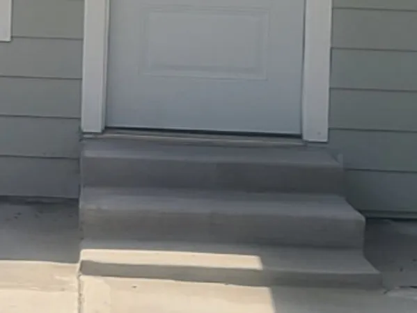 a front view of a house with a garage