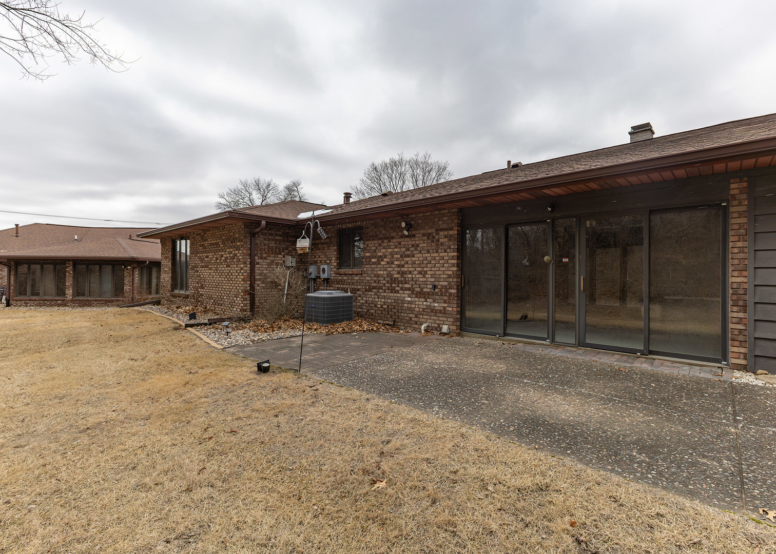 3748 53rd Street Moline, IL 61265 - Photo 23 of 24 a view of a house with a flat door and a yard