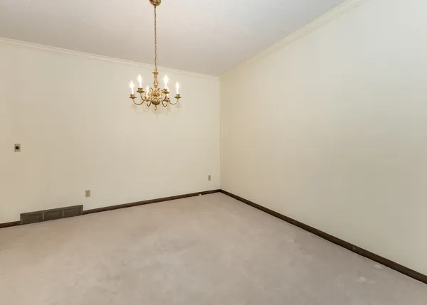 a view of a chandelier in big room