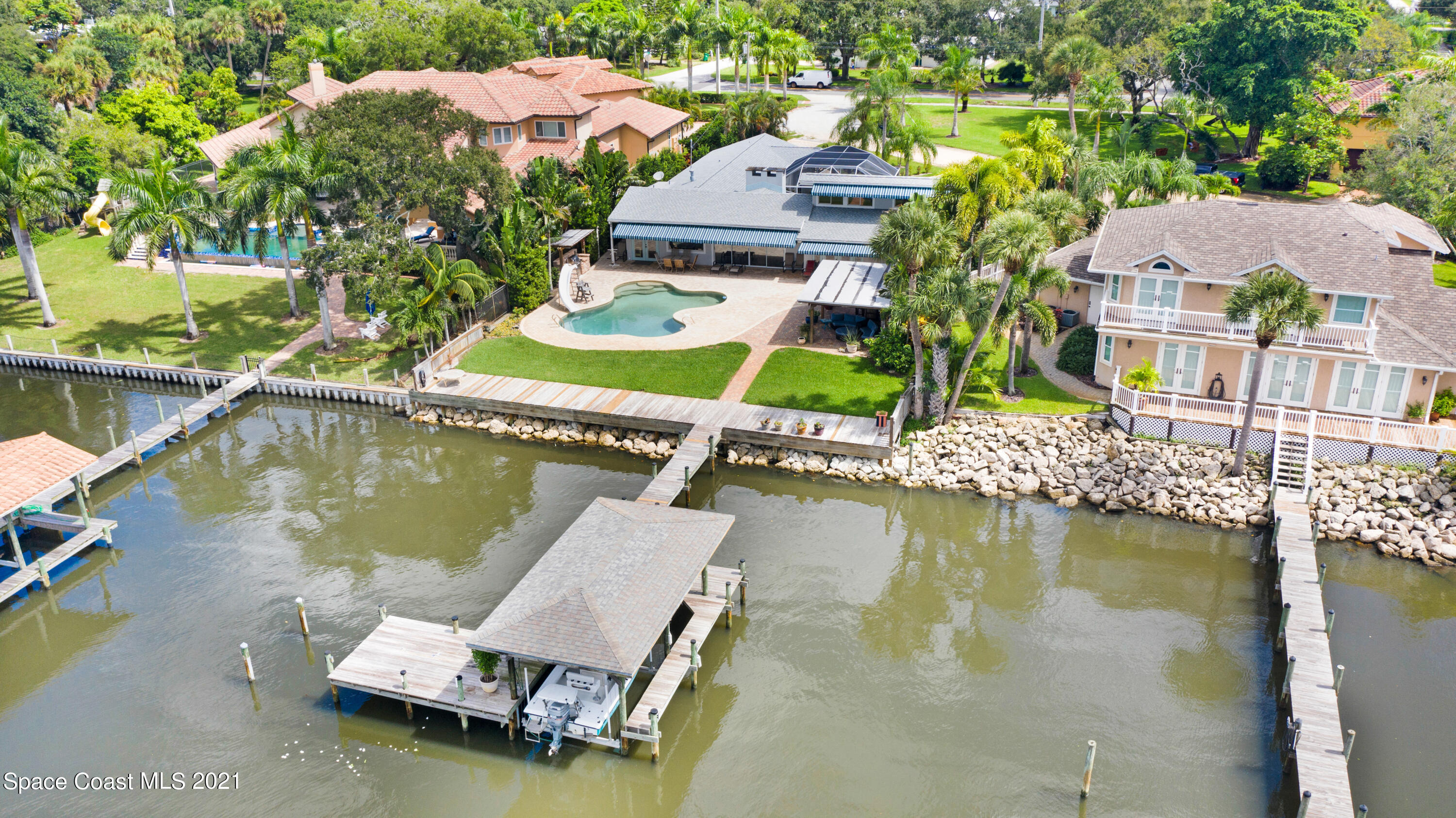 600 North Riverside Drive Indialantic, FL 32903 - Photo 14 of 85 an aerial view of a house with a ocean view