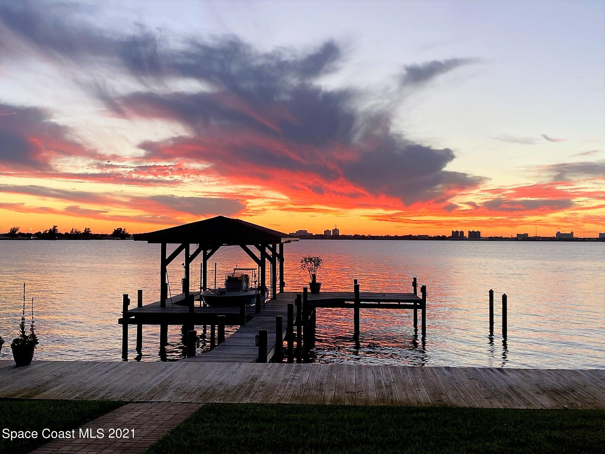 600 North Riverside Drive Indialantic, FL 32903 - Photo 80 of 85 a view of a lake from a balcony