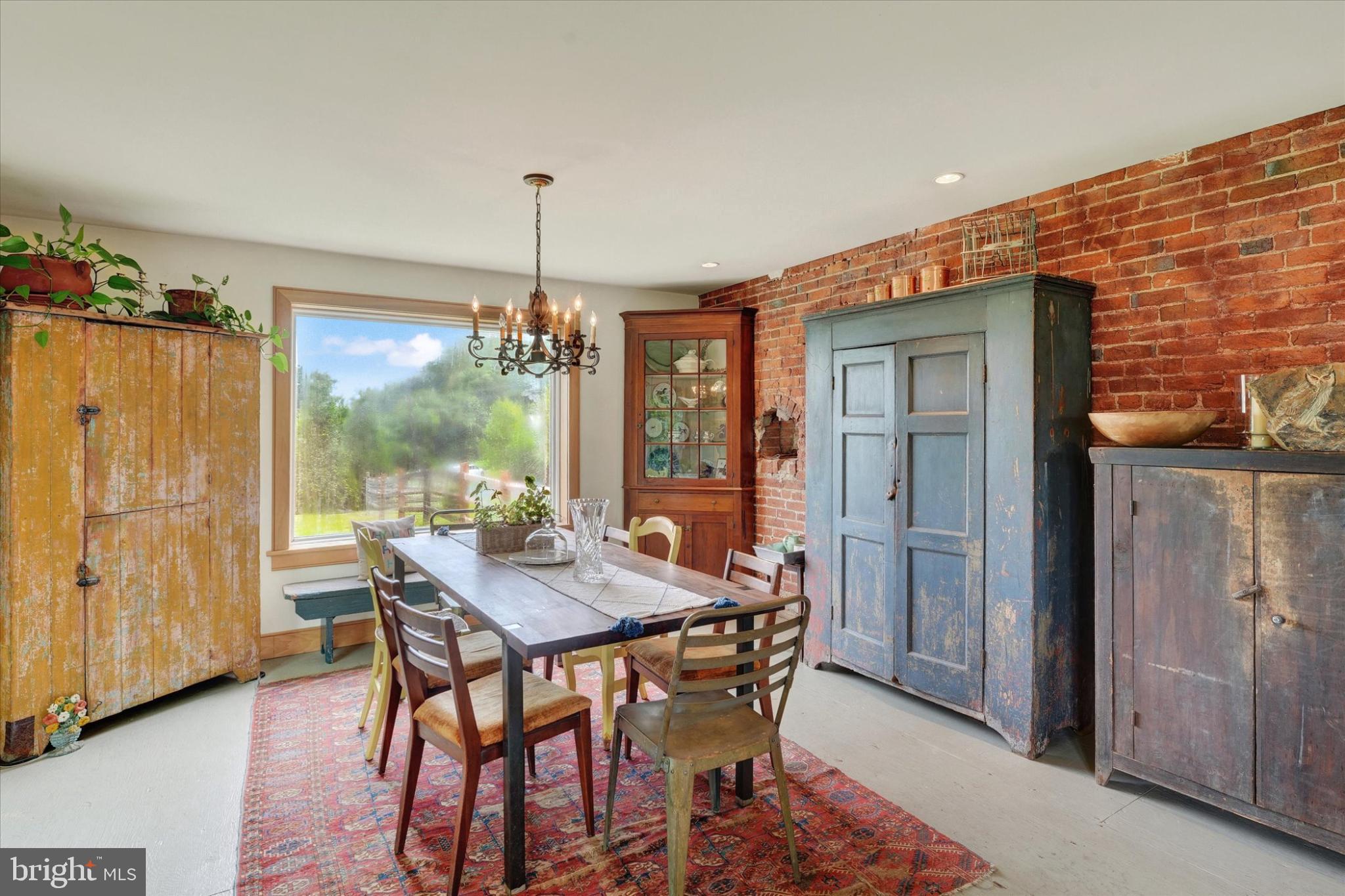 180 Springdell Road Coatesville, PA 19320 - Photo 16 of 55 a view of a dining room with furniture window and outside view