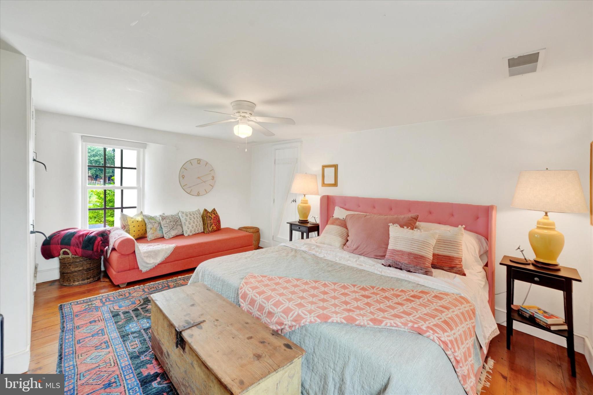 180 Springdell Road Coatesville, PA 19320 - Photo 28 of 55 a bedroom with two beds and a chandelier